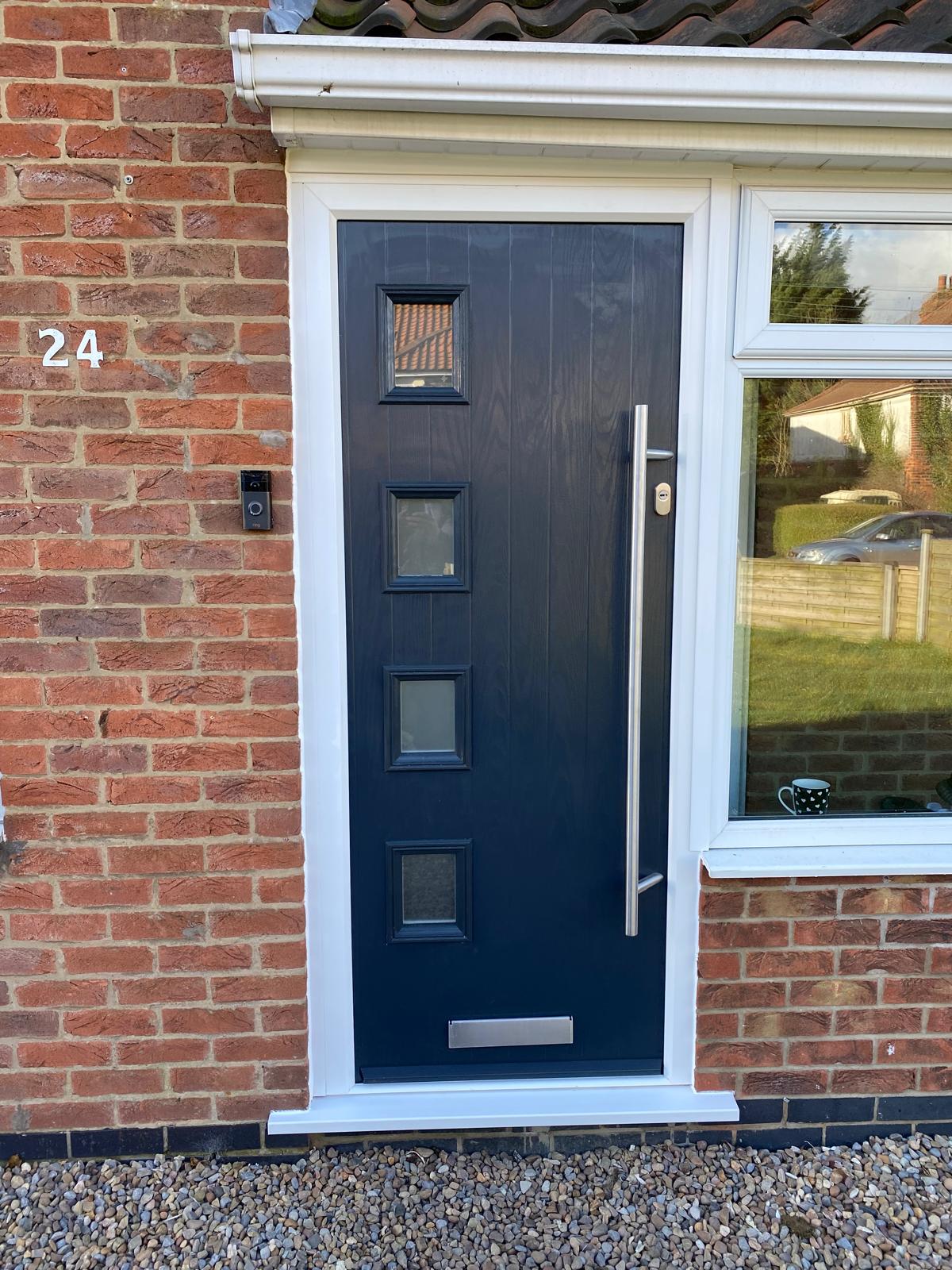 Navy blue composite front door with square glazing Hull